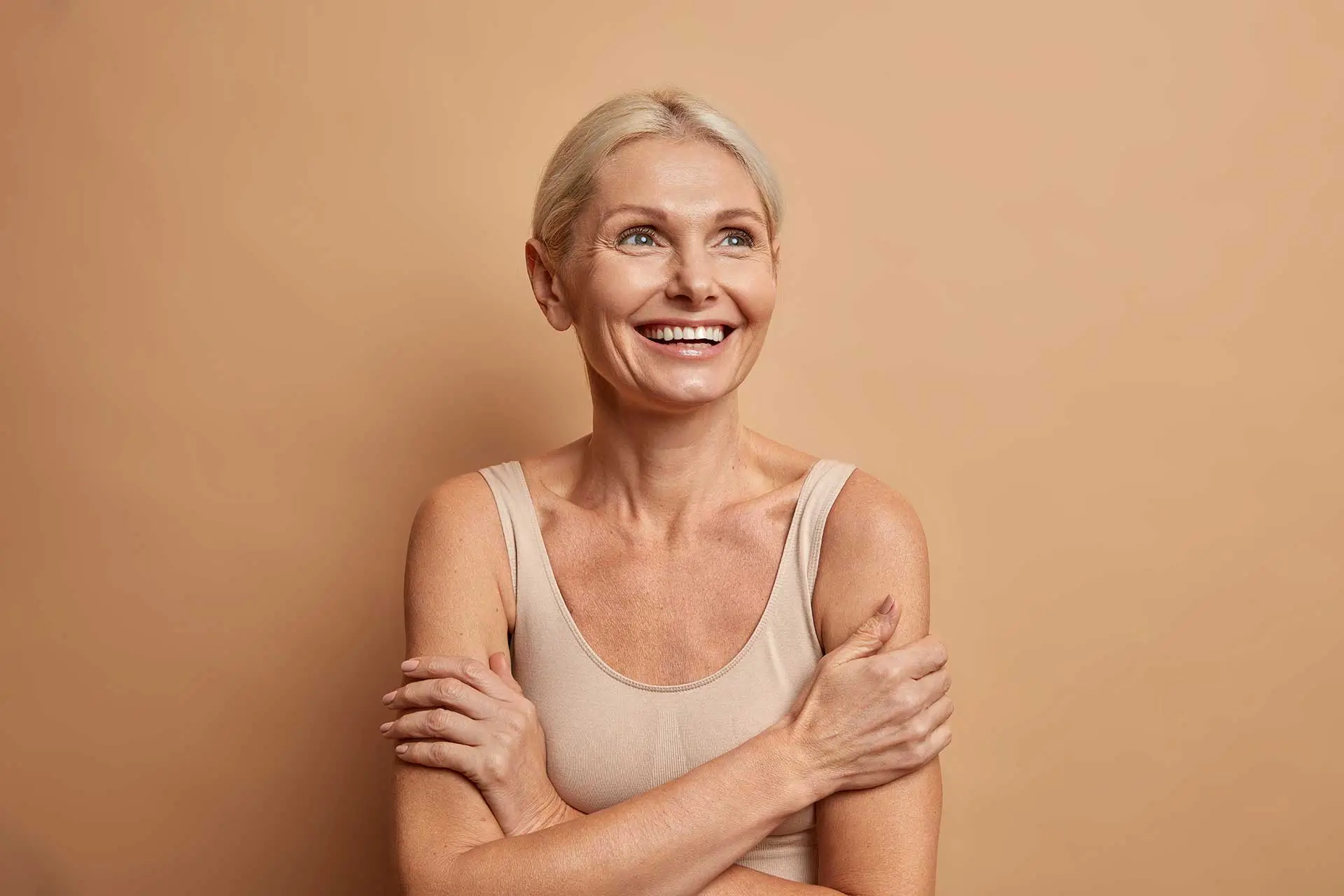Longevity woman looks gladfully